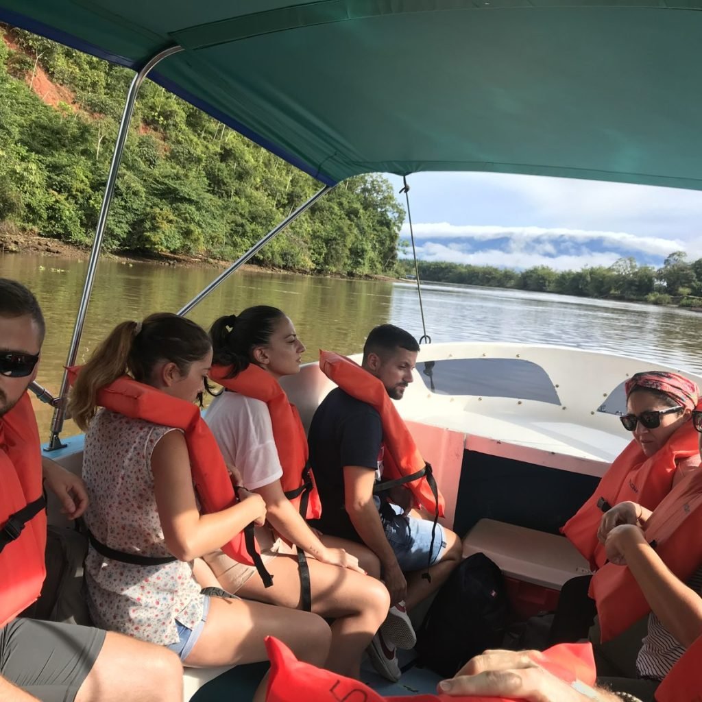 Travelers with life vests on the boat ride to Corcovado National Park with Wakoo Tours
