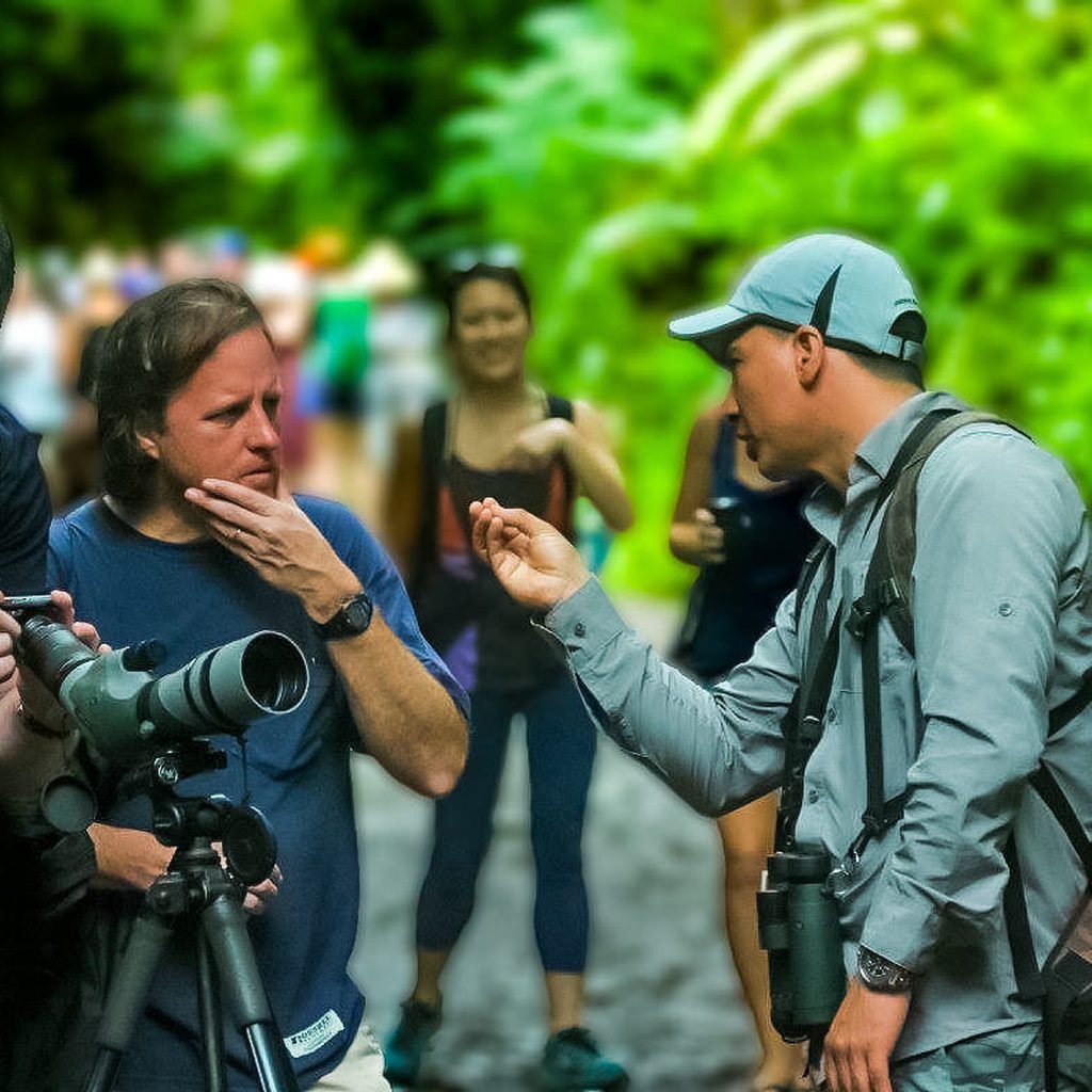 Wakoo Tours guide explaining wildlife to guests on the VIP private tour inside Manuel Antonio National Park