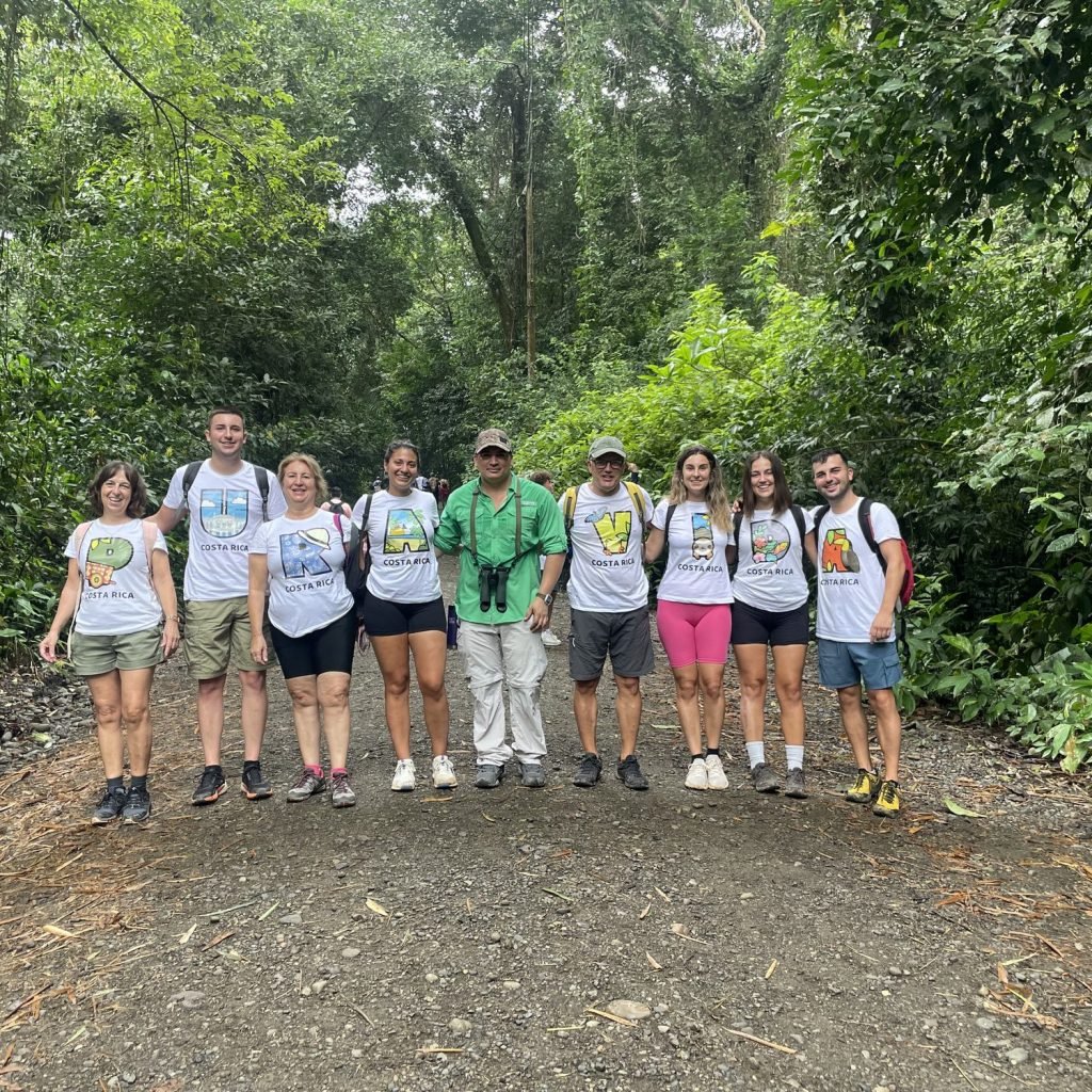 Small group of guests with their naturalist guide on a forest trail inside Manuel Antonio National Park